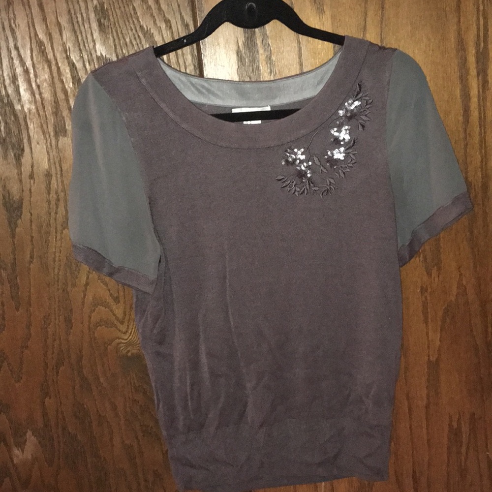 Gray sweater/blouse.